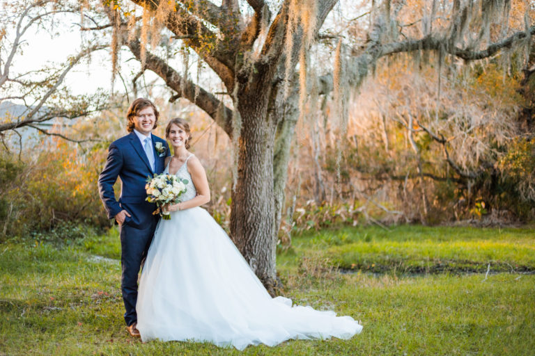 Minnesota wedding couple Dani and Noah smile at the camera during their elopement with Forever and Evergreens.