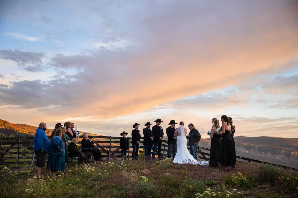 A family gathers for a sunrise wedding ceremony near in the Bighorn National Forest.