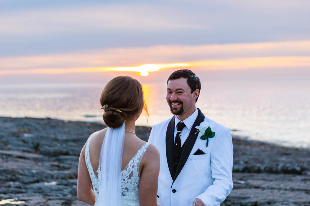 Sunrise first look during north shore elopement