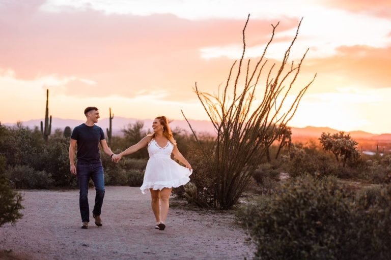 A short dress makes it easy for this bride to hike in her wedding dress during her elopement in Lost Dutchman State Park near Phoenix, Arizona.