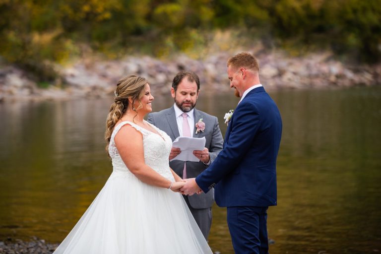A couple exchanges vows during the wedding ceremony of their Devil's Lake elopement.