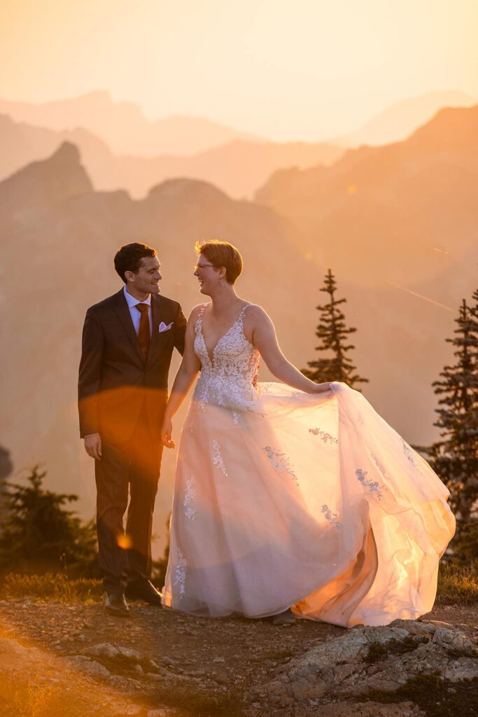 A couple dance in the golden light of sunset during their Mount Baker Elopement in Washington state.